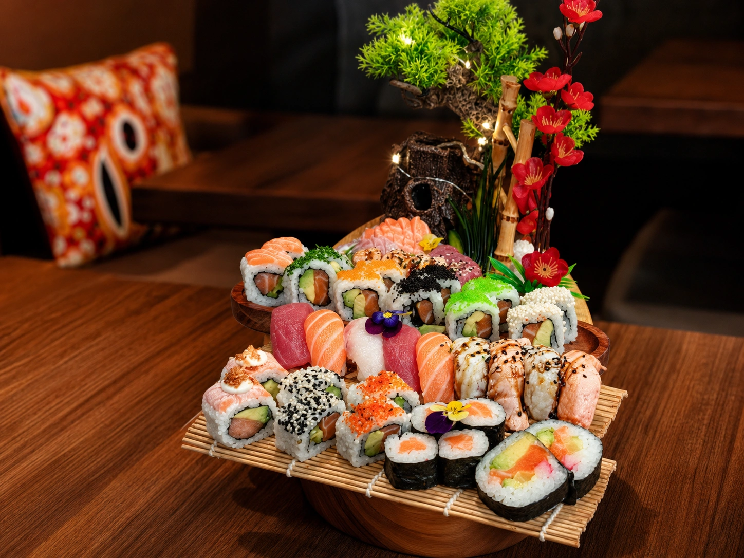 Decorative sushi boat with rolls and nigiri
